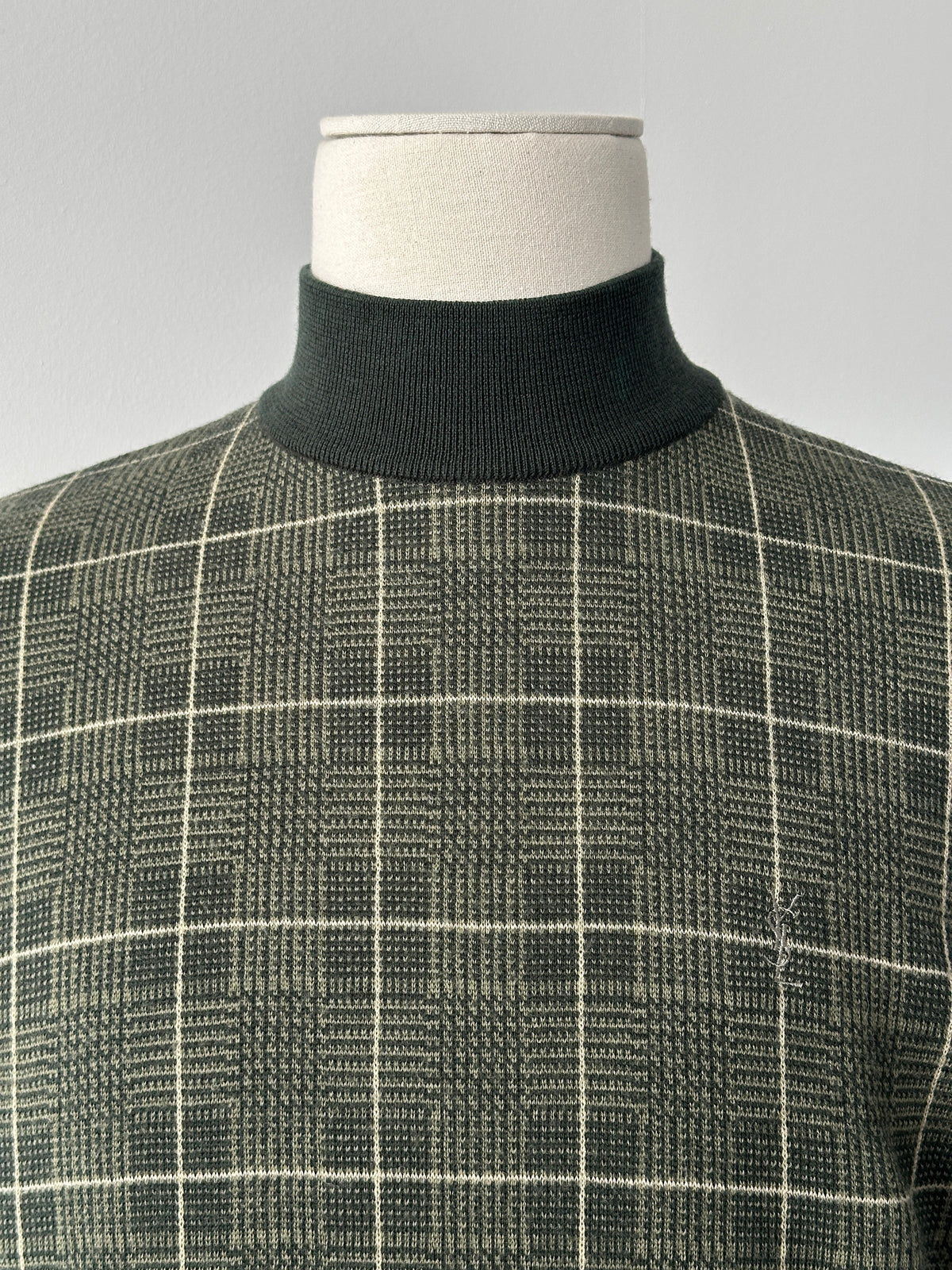 Yves Saint Laurent 1990s pure wool check high neck jumper in size S-M, featuring classic plaid pattern and high neckline.