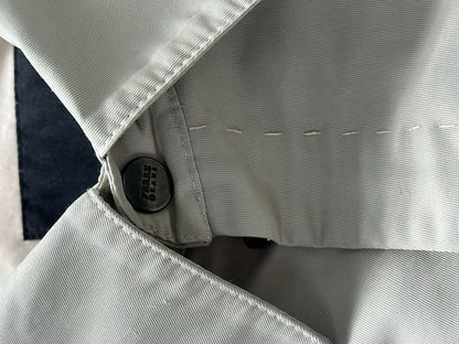 Gianfranco Ferre 1990s showerproof minimal jacket in size L, featuring sleek design and lightweight material, front view.