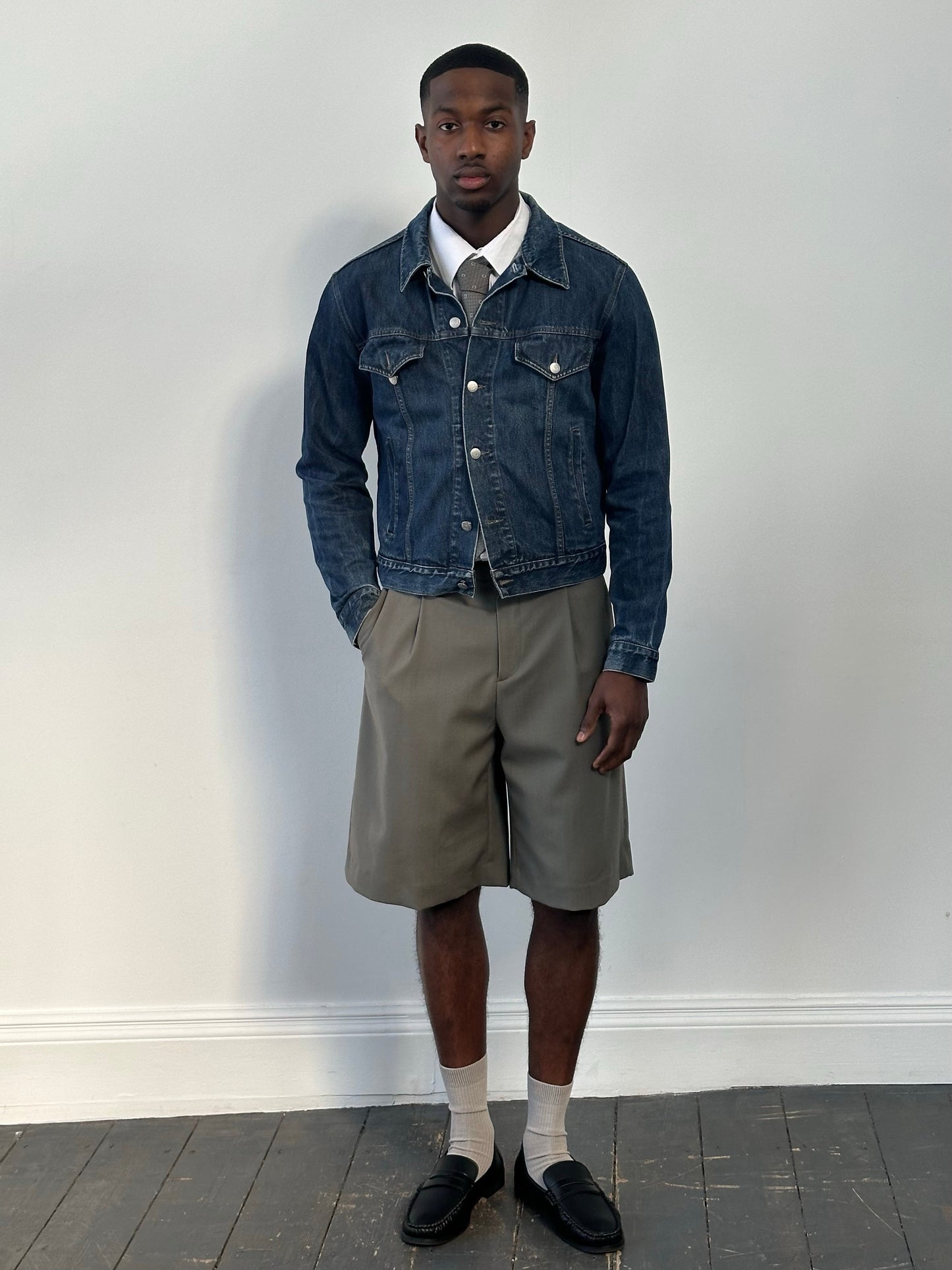 Armani Jeans 1990s pure cotton denim jacket in medium size, featuring classic blue denim with button closure and chest pockets.