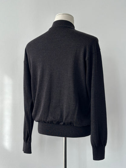 Yves Saint Laurent 1990s wool high neck jumper in size M, featuring a classic high neckline and textured knit fabric.