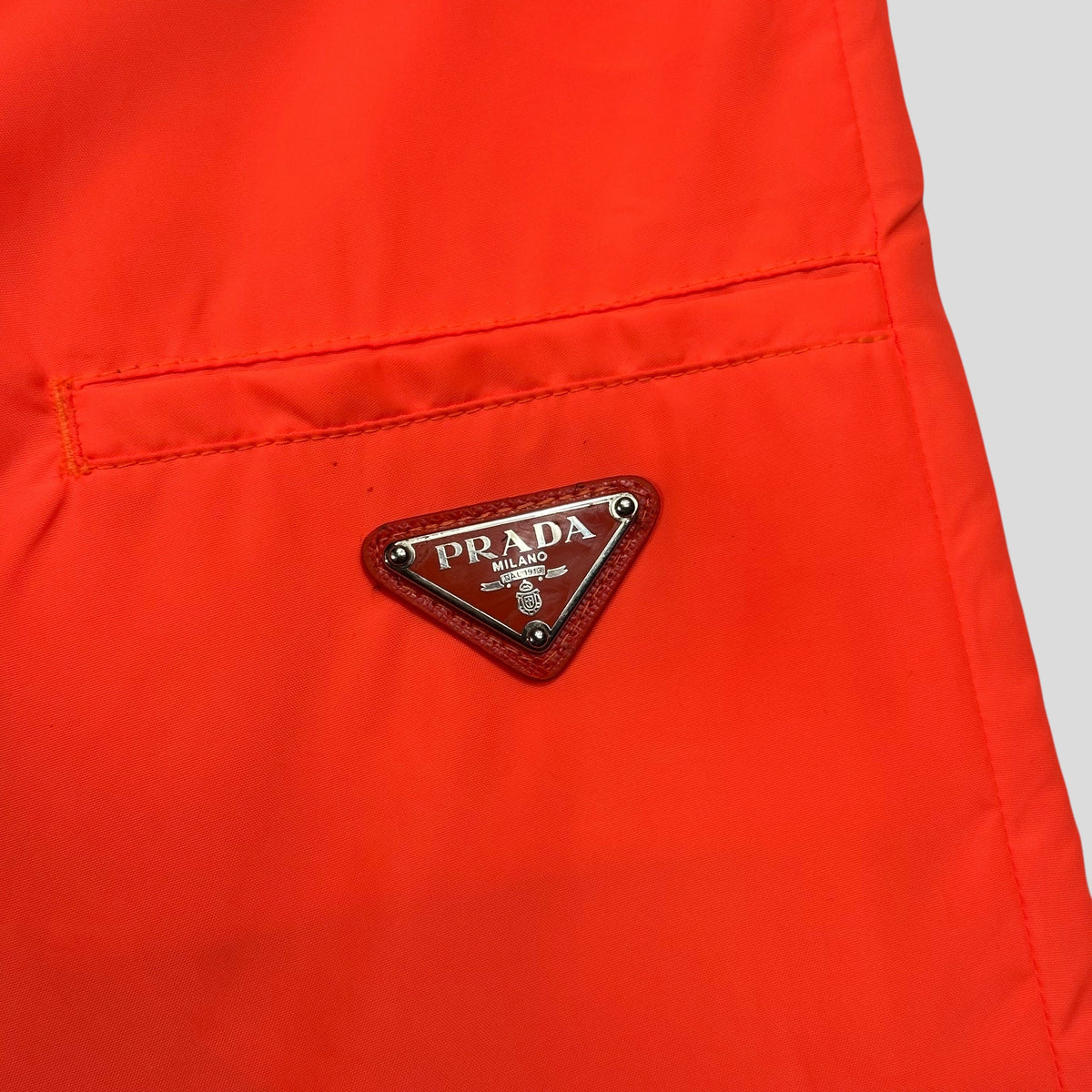 Prada Milano 2018 Orange Nylon Gabardine Triangle Logo Trousers - S/M | Small, Orange