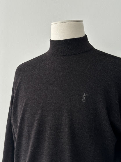 Yves Saint Laurent 1990s wool high-neck jumper in black, featuring a classic high collar and tailored fit, front view.