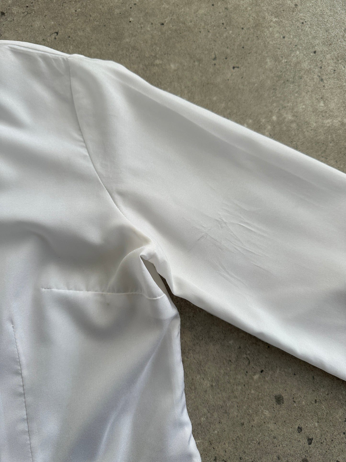 Vintage 1980s neck tie shirt in S/M size, featuring retro style, classic collar, and vintage fabric pattern.