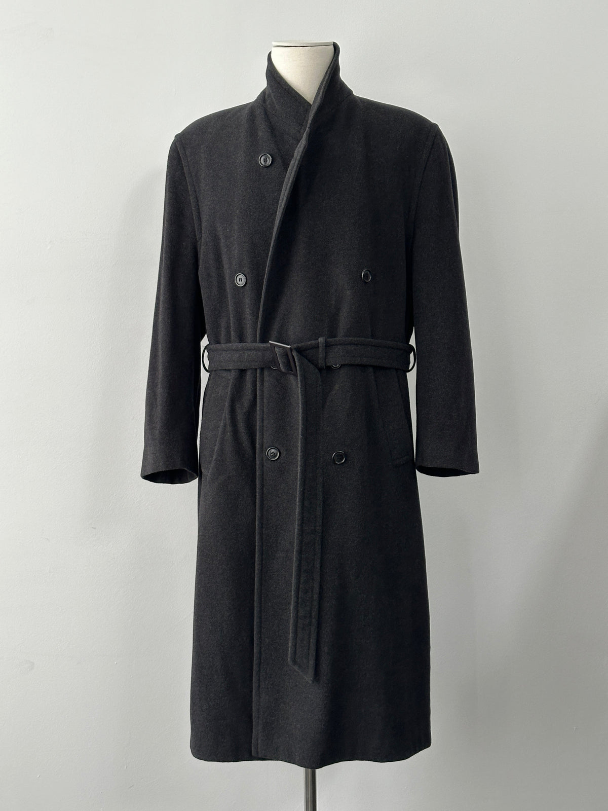 Vintage 1990s wool cashmere high neck belted coat, size L, with classic design and neutral color, displayed on a hanger.