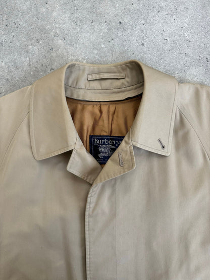 Burberry 1990s pure cotton high neck trench coat in beige, front view, with classic collar and button details.