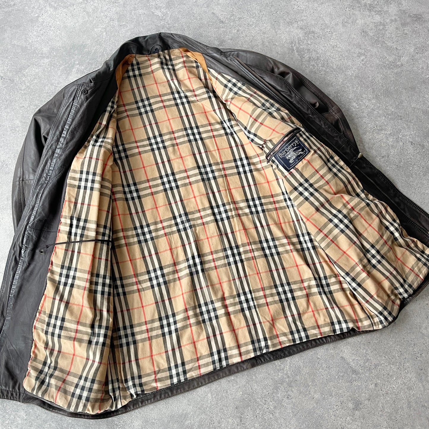 Burberry’s 1990s heavyweight nova check leather jacket (XL)