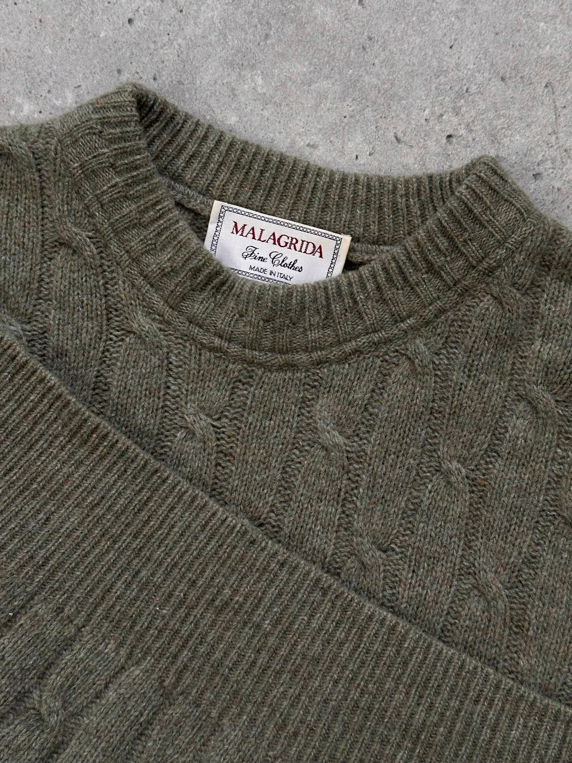 Vintage Italian 1990s wool knitted jumper in XL, featuring a cozy, textured knit pattern and classic style.