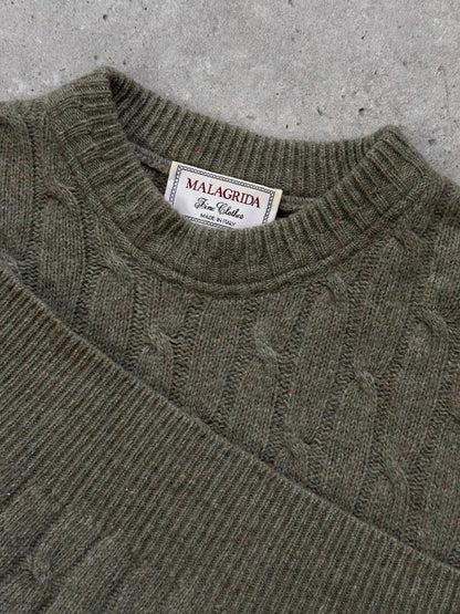 Vintage Italian 1990s wool knitted jumper in XL, featuring a cozy, textured knit pattern and classic style.