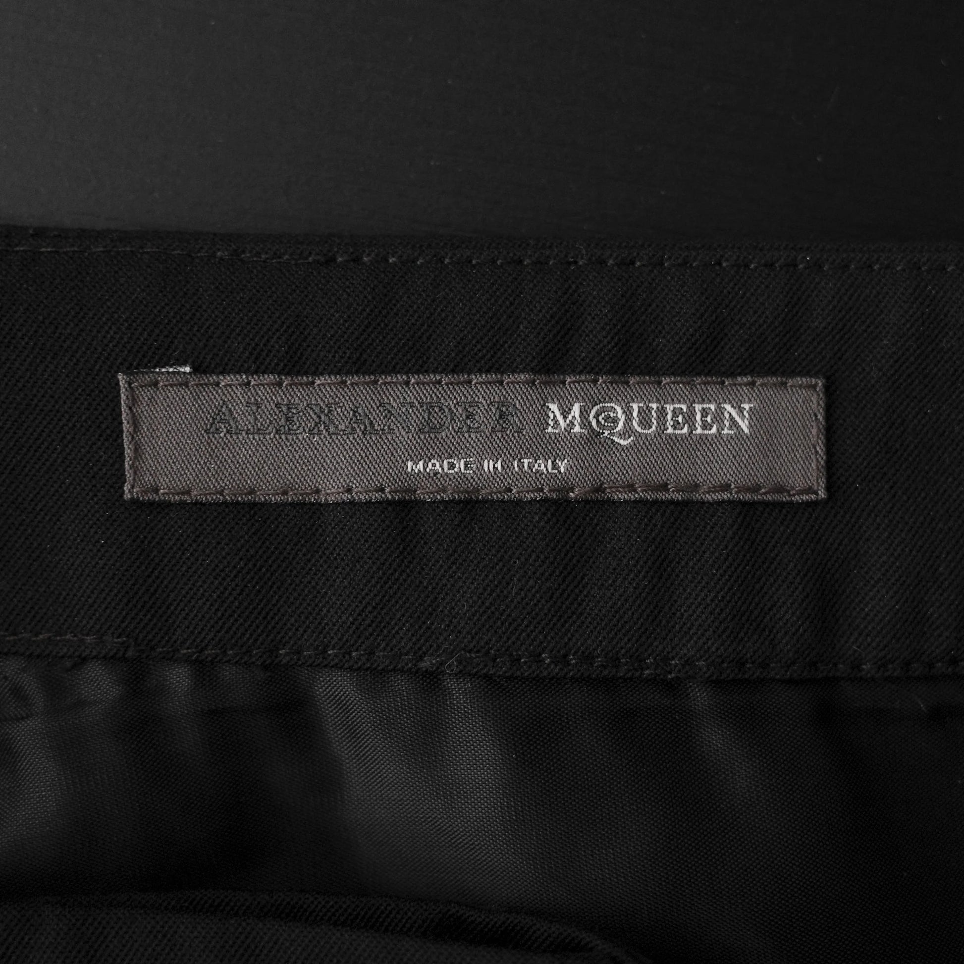 https://images.squarespace-cdn.com/content/v1/673cad159307f210013ba2f7/5db0c7f5-8378-419a-87ae-1e2a831c4a6d/AlexanderMcQueen_Fall2002_ButtonTailoredTrouser_6.jpg