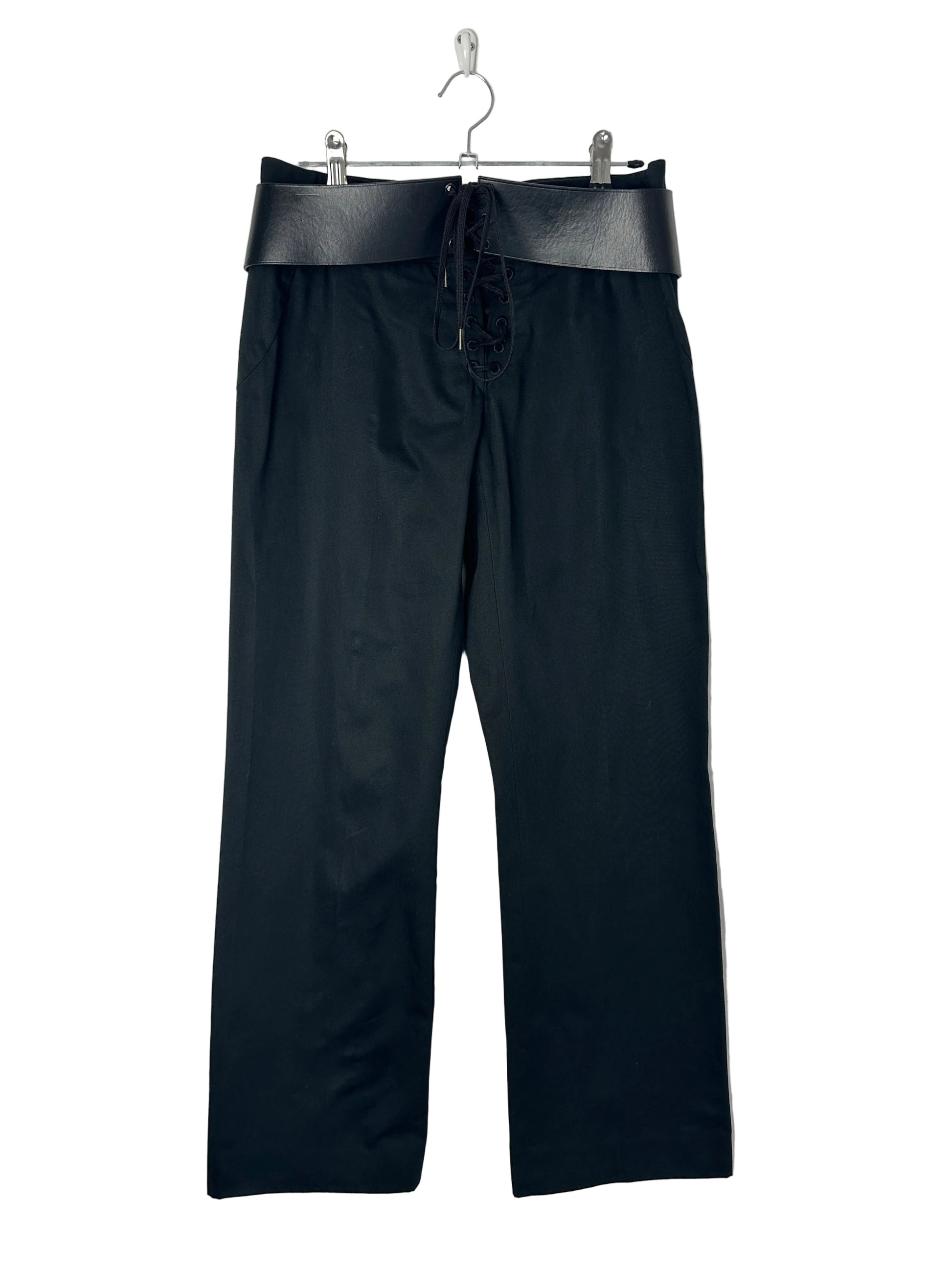 https://cdn.shopify.com/s/files/1/0900/2729/5066/files/Alexander_McQueen_S_S_2002_Runway_Corset_Trousers_Hanger.jpg?v=1775148451