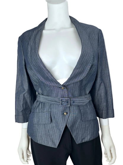 A blue-gray pinstriped wrap jacket with a belted waist and front pockets, displayed on a white mannequin torso with black trousers against a plain light background.
