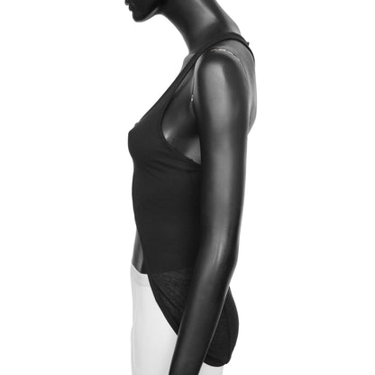 Ann Demeulemeester 2000s rib knit tank top with an asymmetric hem and racerback. Size FR 36 / UK 8. Available at Artefact Archive.