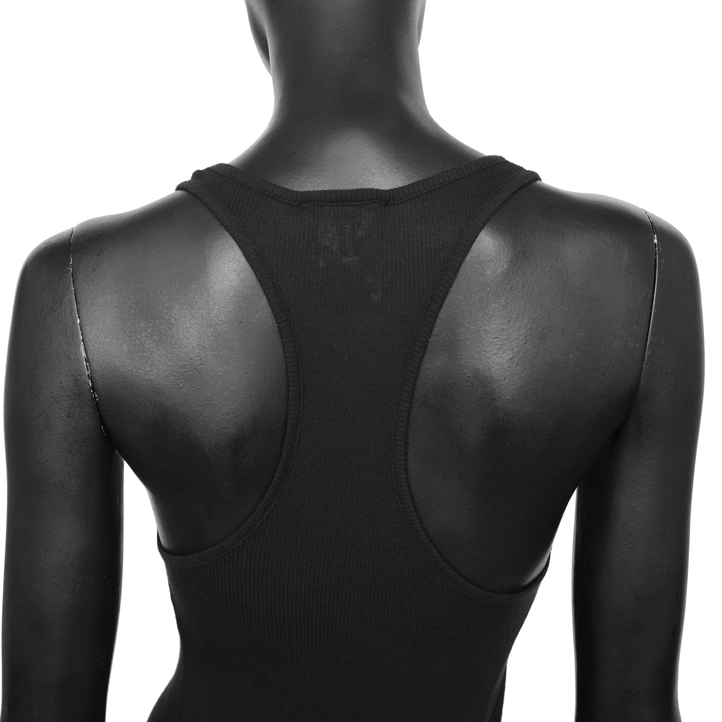 Ann Demeulemeester 2000s rib knit tank top with an asymmetric hem and racerback. Size FR 36 / UK 8. Available at Artefact Archive.