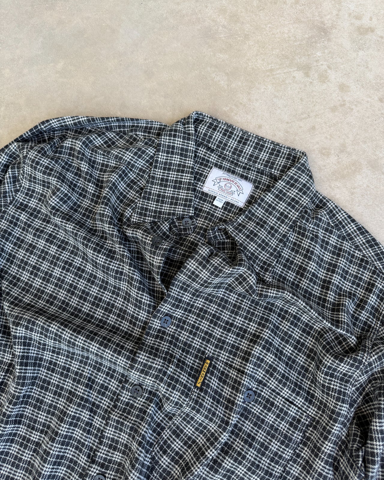 Armani Jeans Black and Grey Checked Long Sleeve Shirt – L/XL-on a concrete background