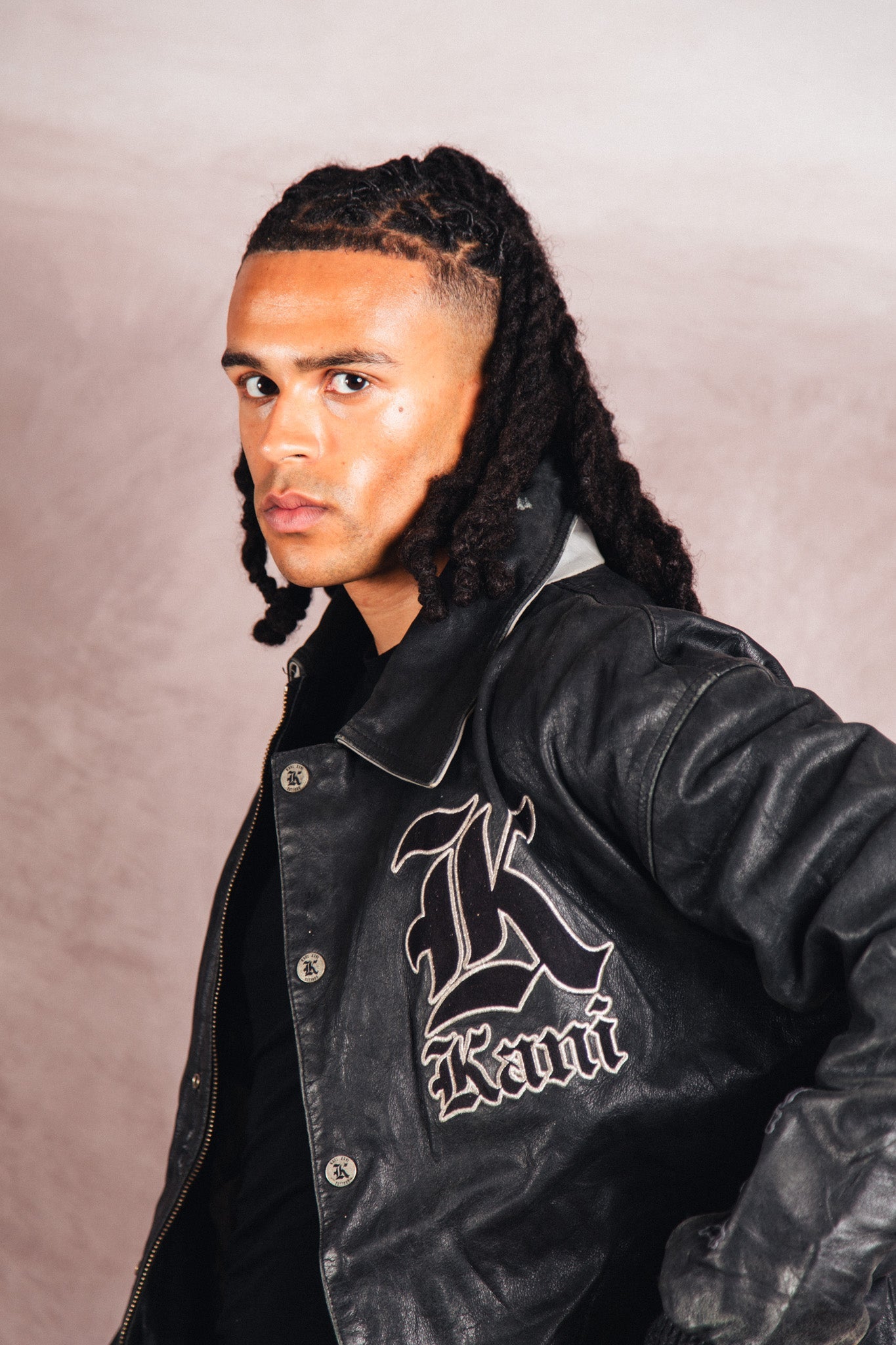 Karl Kani Logo Embossed Black Leather Varsity Jacket | Extra Large, Multicoloured