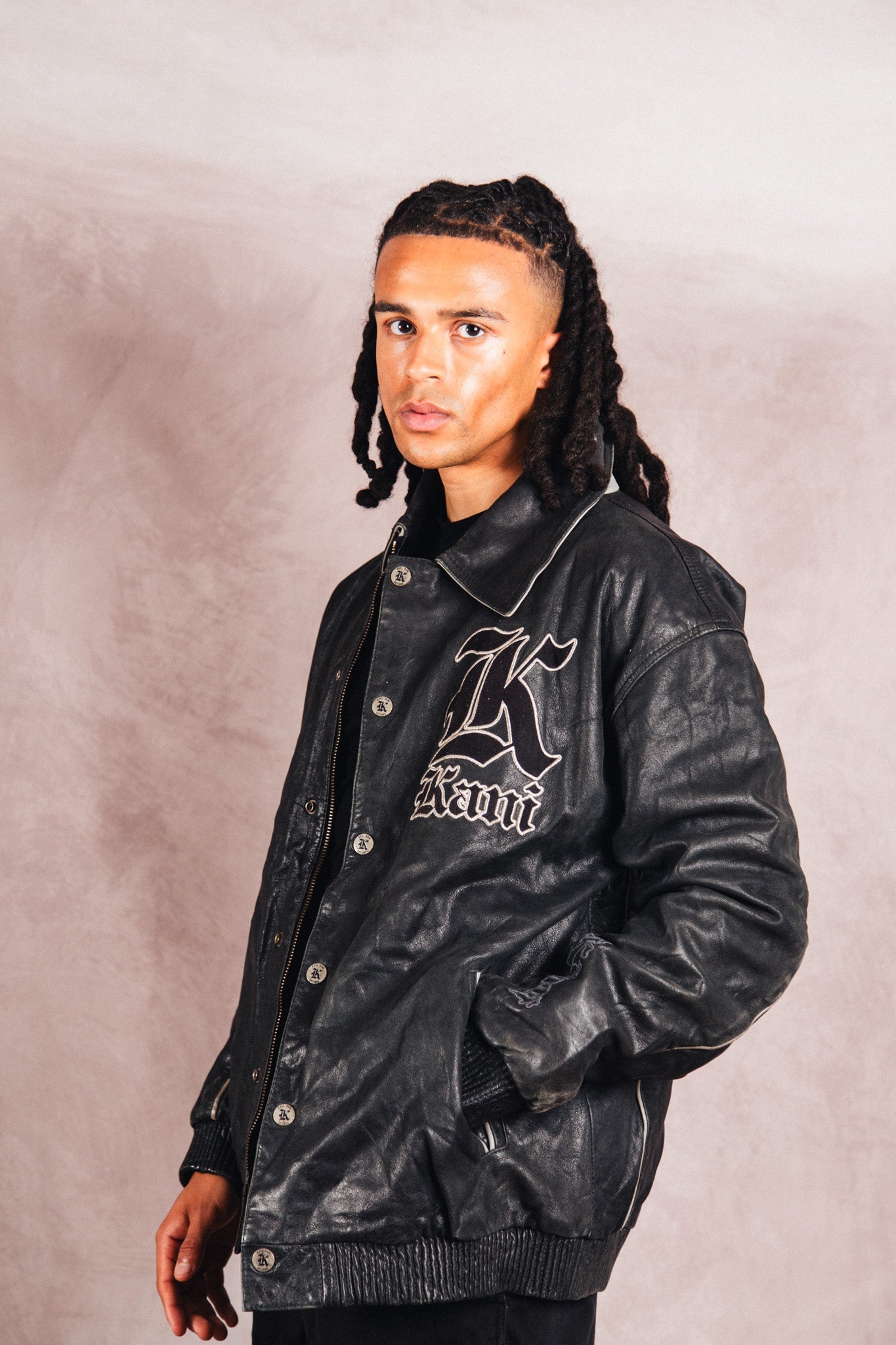 Karl Kani Logo Embossed Black Leather Varsity Jacket | Extra Large, Multicoloured