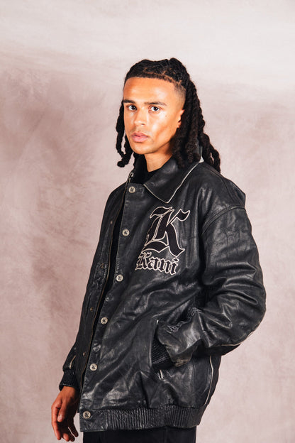 Karl Kani Logo Embossed Black Leather Varsity Jacket | Extra Large, Multicoloured