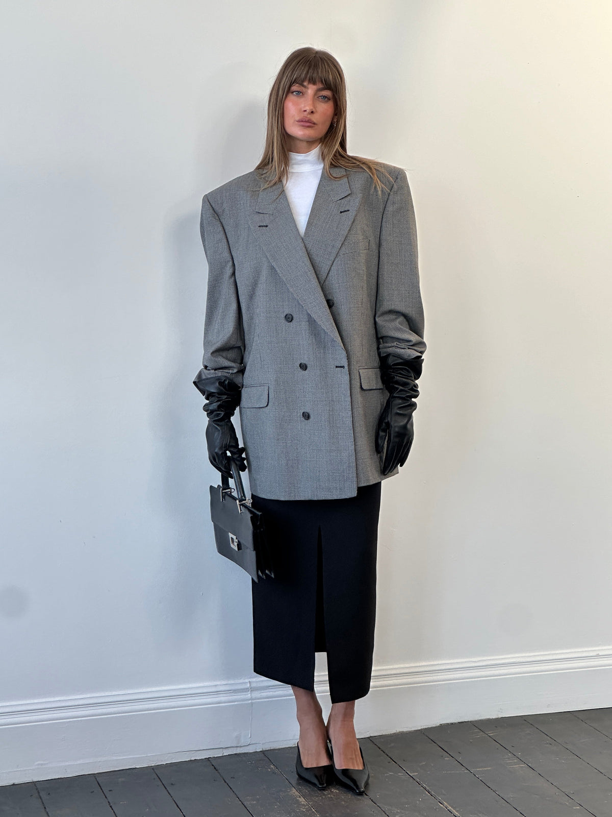 Christian Dior Monsieur 1980s pure wool houndstooth blazer in size 44R/XL, tailored fit with classic pattern and structured design.