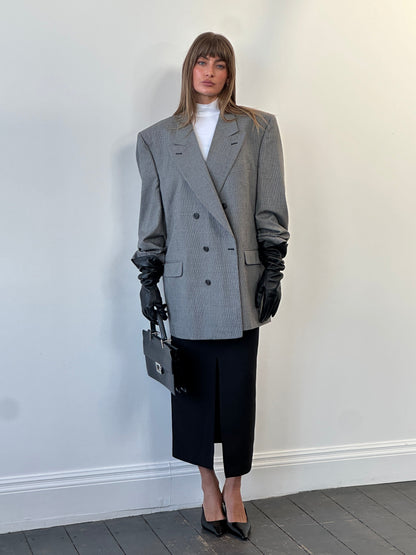 Christian Dior Monsieur 1980s pure wool houndstooth blazer in size 44R/XL, tailored fit with classic pattern and structured design.