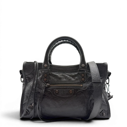 https://cdn.shopify.com/s/files/1/0564/9376/8855/files/Balenciaga_City_Bag_schwarz_1.webp?v=1782378237