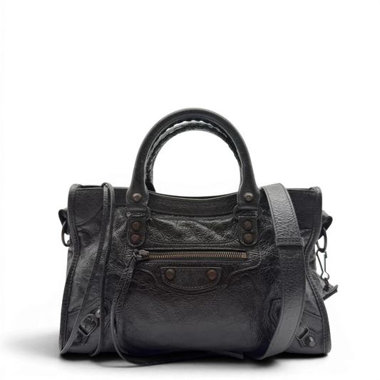 https://cdn.shopify.com/s/files/1/0564/9376/8855/files/Balenciaga_City_Bag_schwarz_1.webp?v=1782378237