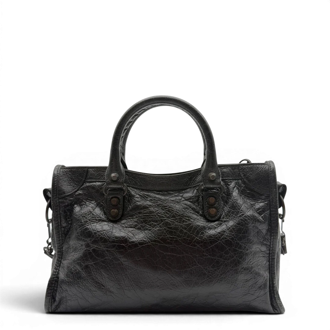 https://cdn.shopify.com/s/files/1/0564/9376/8855/files/Balenciaga_City_Bag_schwarz_2.webp?v=1782378237