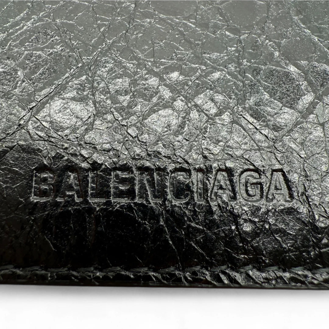 https://cdn.shopify.com/s/files/1/0564/9376/8855/files/Balenciaga_Geldbeutel_aus_Leder_schwarz_wallet0731.webp?v=1761139929