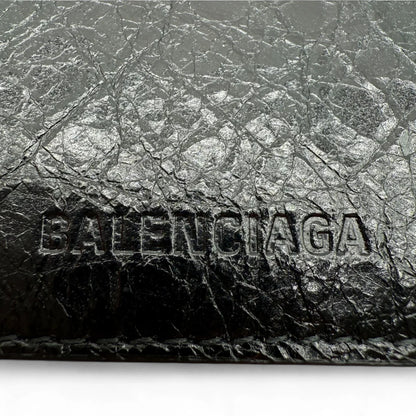 https://cdn.shopify.com/s/files/1/0564/9376/8855/files/Balenciaga_Geldbeutel_aus_Leder_schwarz_wallet0731.webp?v=1761139929