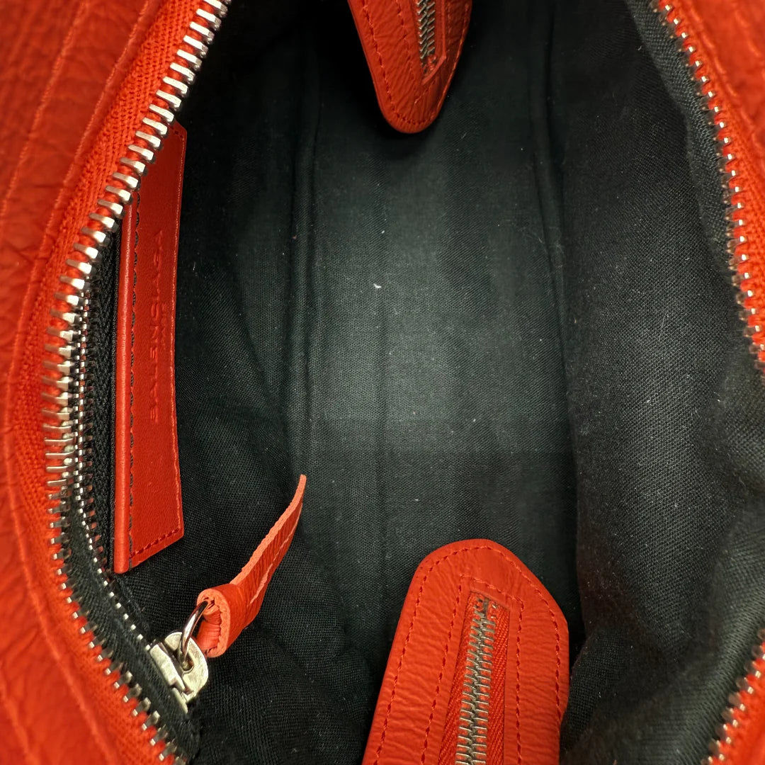 https://cdn.shopify.com/s/files/1/0564/9376/8855/files/Balenciaga_Handtasche_City_bag_small_aus_Lammleder_orange_vintage_handbag2712.webp?v=1762520503