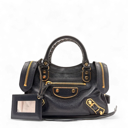 https://cdn.shopify.com/s/files/1/0564/9376/8855/files/Balenciaga_Handtasche_Giant_City_small_mit_Umhangegurt_aus_Leder_dunkelblau_1.webp?v=1781772542