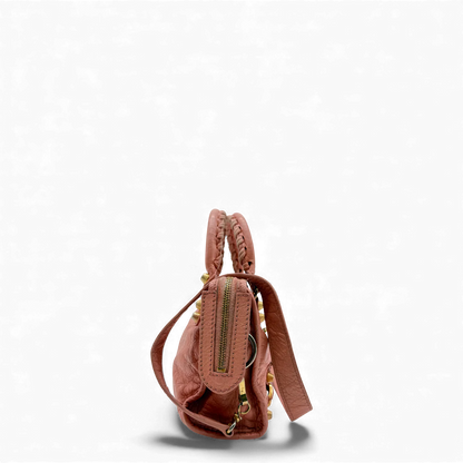 https://cdn.shopify.com/s/files/1/0564/9376/8855/files/Balenciaga_Handtasche_Gianty_City_mini_aus_Leder_rosa_vintage_handbag4259.webp?v=1764853465