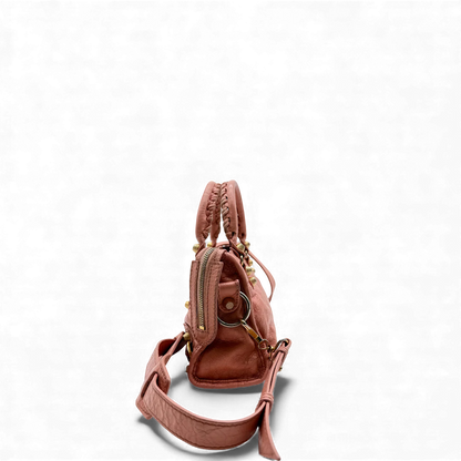 https://cdn.shopify.com/s/files/1/0564/9376/8855/files/Balenciaga_Handtasche_Gianty_City_mini_aus_Leder_rosa_vintage_handbag4260.webp?v=1764853465