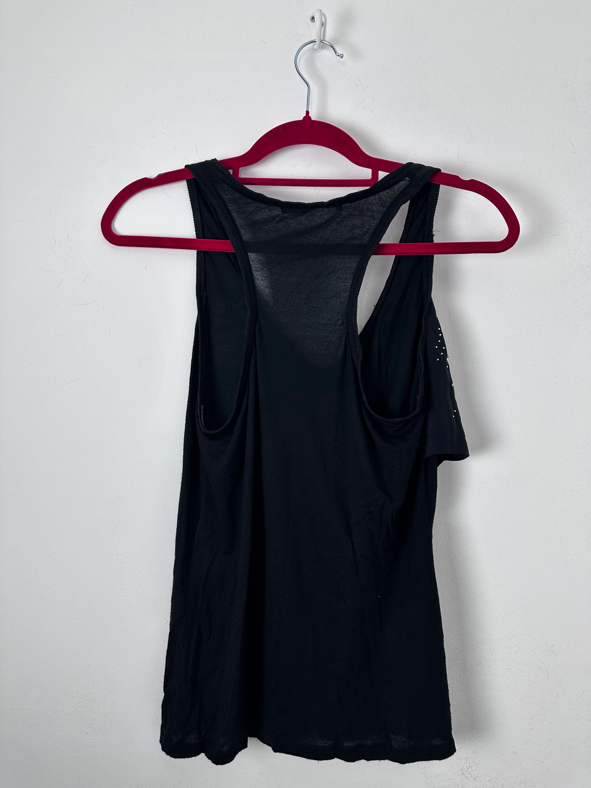 Black tank on a red hanger against a white background