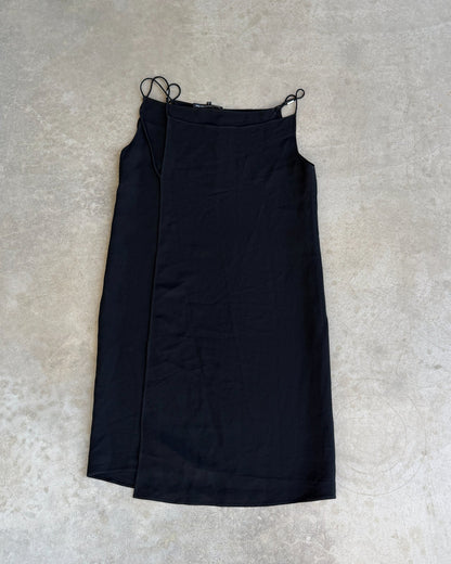 Francisco Costa for Calvin Klein Black Wrap Panel Dress-on a concrete background