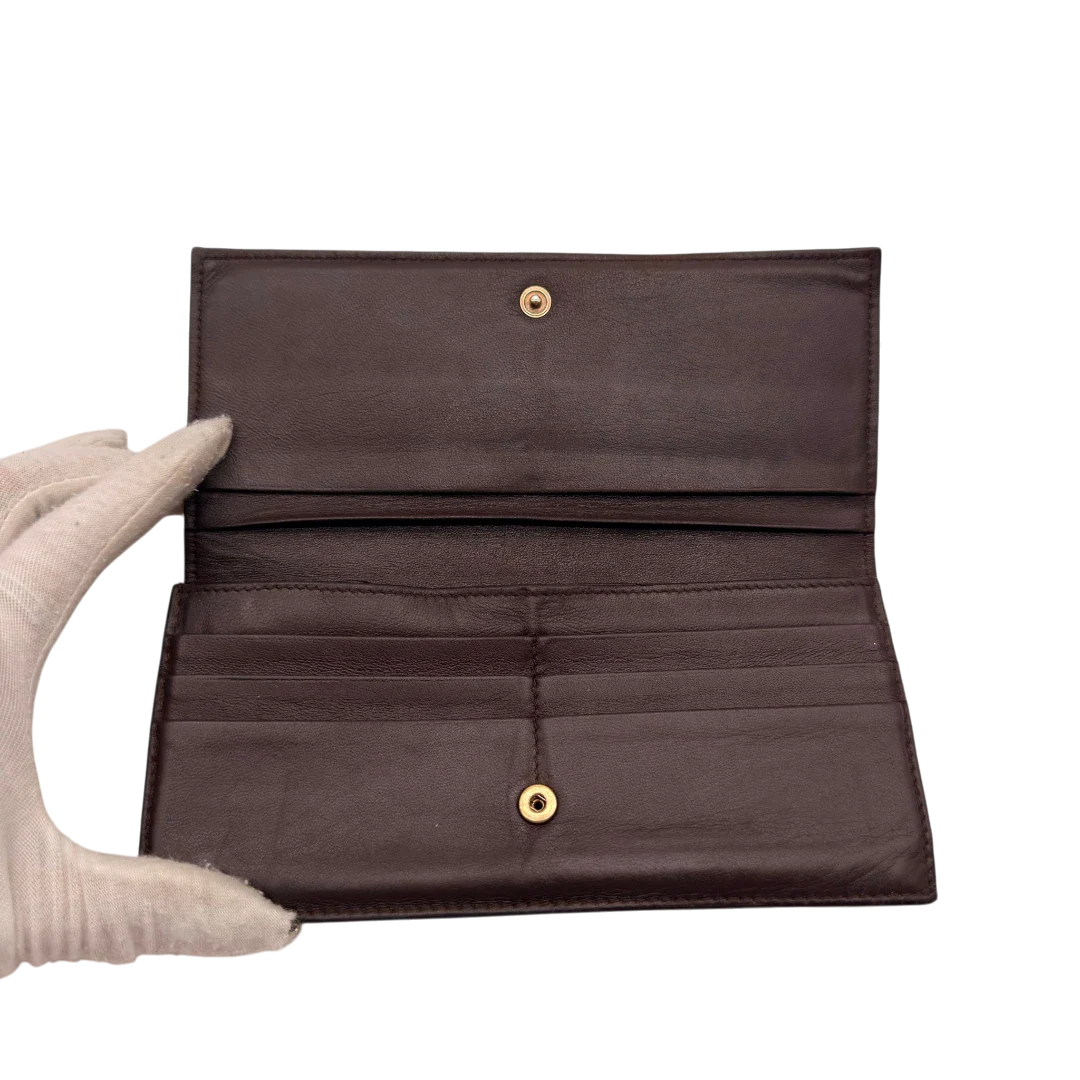 https://cdn.shopify.com/s/files/1/0564/9376/8855/files/Bottega_Veneta_Geldbeutel_Intrecciato_aus_Leder_dunkelbraun_14.webp?v=1784242042
