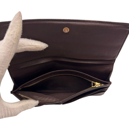 https://cdn.shopify.com/s/files/1/0564/9376/8855/files/Bottega_Veneta_Geldbeutel_Intrecciato_aus_Leder_dunkelbraun_16.webp?v=1784242042
