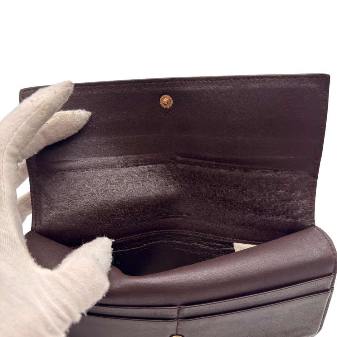 https://cdn.shopify.com/s/files/1/0564/9376/8855/files/Bottega_Veneta_Geldbeutel_Intrecciato_aus_Leder_dunkelbraun_20.webp?v=1784242043