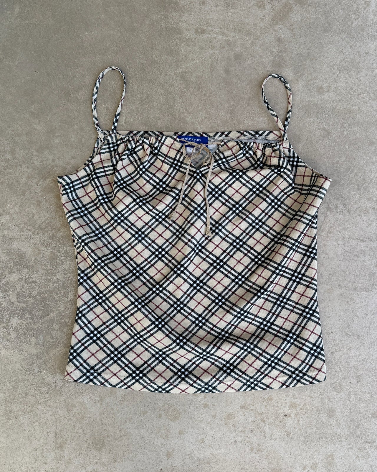 Burberry Blue Label Nova Print Vest Top – M-on a concrete background