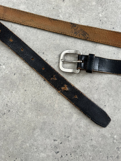 Vintage 1980s chrome distressed leather belt, W30-38, featuring a classic buckle and aged finish, displayed on a neutral background.