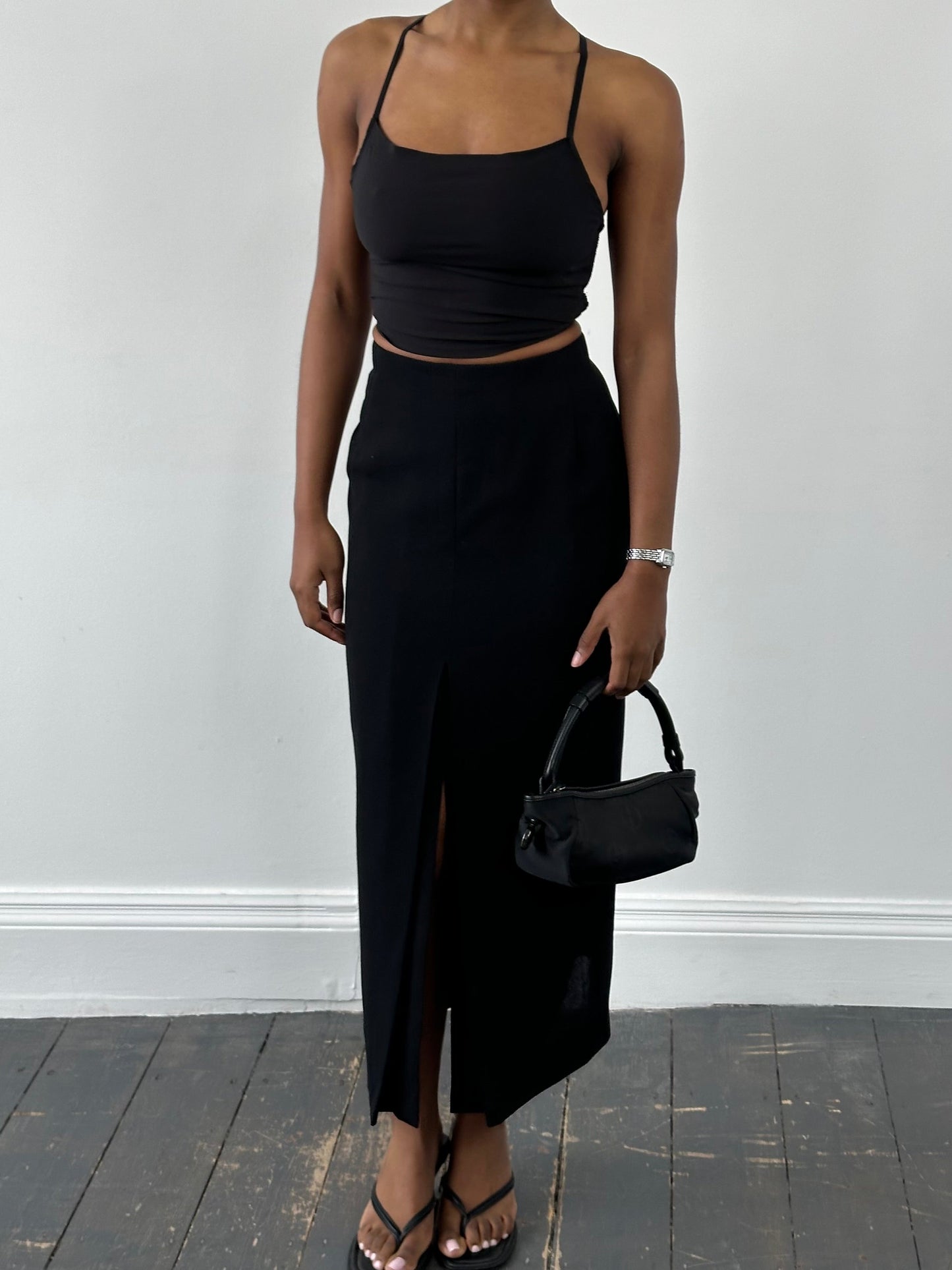 Jaeger 1990s pure wool side split maxi skirt in neutral color, featuring a high waist and flowing length.