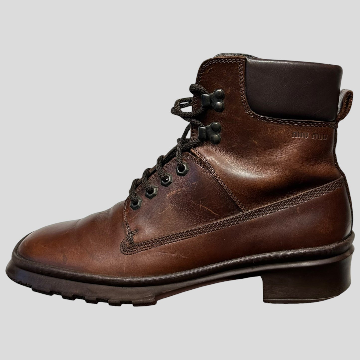 Miu Miu 00’s Padded Leather Embossed Logo Combat Boots - UK8 | DEFAULT TITLE, Brown