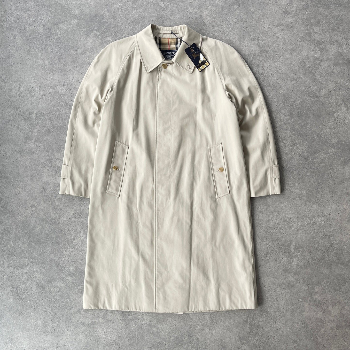 Burberry’s 1990s nova check cream trench jacket (M)