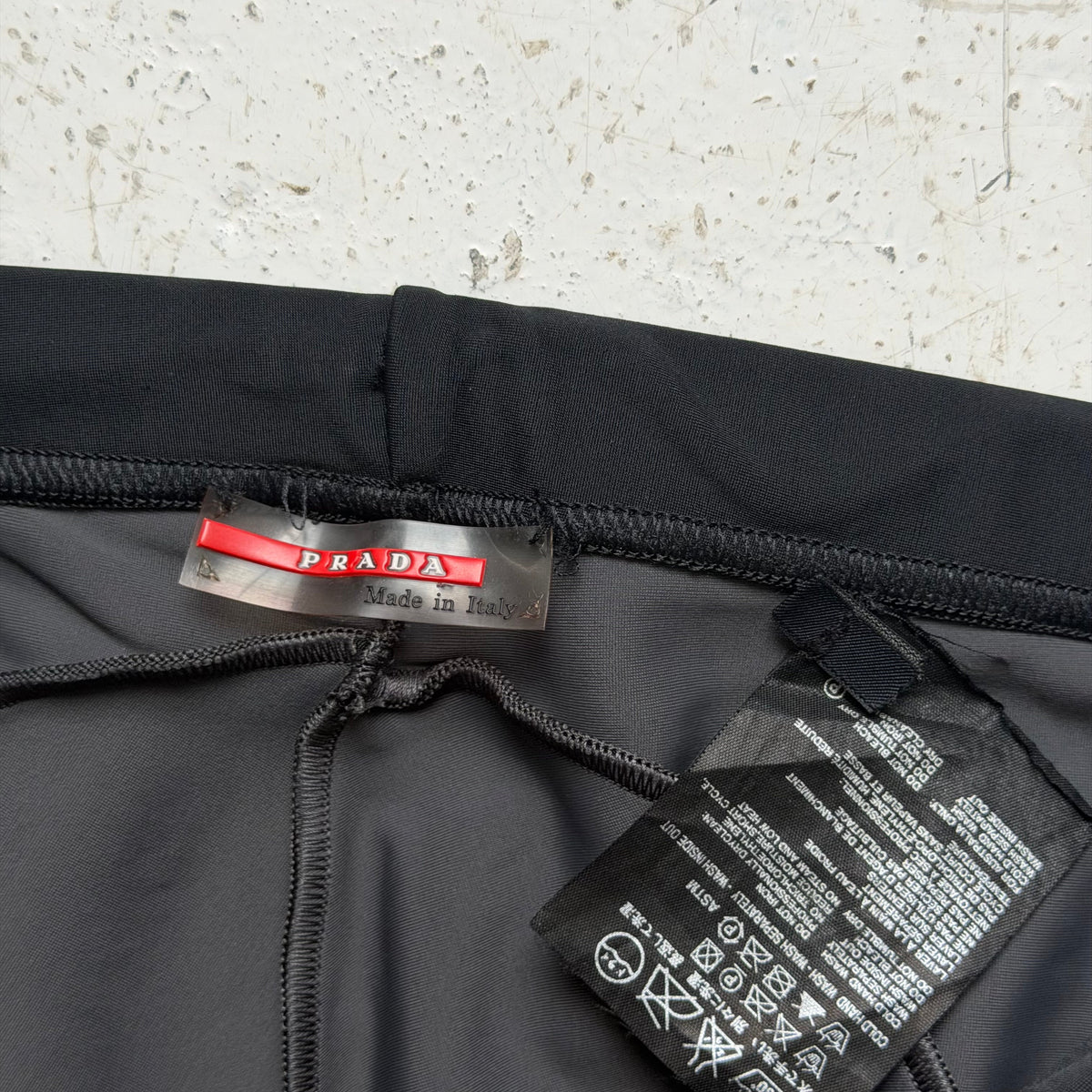 2000s prada sport neoprene panelled flared trousers | O/S, Red