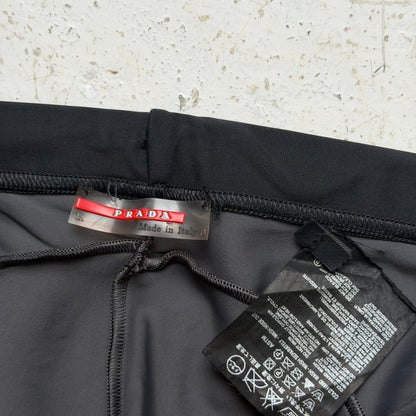 2000s prada sport neoprene panelled flared trousers | O/S, Red