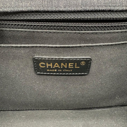 https://cdn.shopify.com/s/files/1/0564/9376/8855/files/Chanel_Flap_Denim_Stoff_schwarz_vintage_5670.webp?v=1765455740