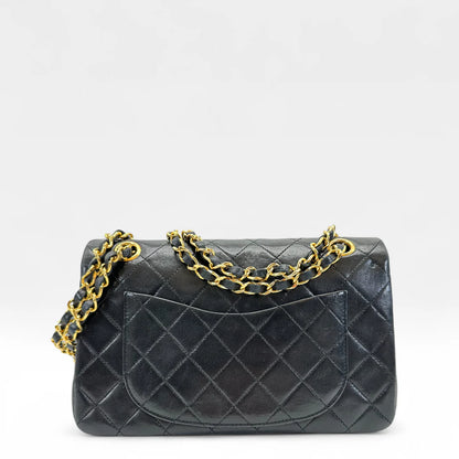 https://cdn.shopify.com/s/files/1/0564/9376/8855/files/Chanel_Handtasche_Double_Flap_25_aus_Lammleder_schwarz_vintage_CC_handbag9872.webp?v=1761872466