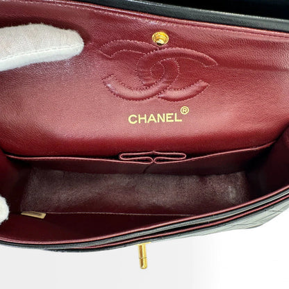 https://cdn.shopify.com/s/files/1/0564/9376/8855/files/Chanel_Handtasche_Double_Flap_25_aus_Lammleder_schwarz_vintage_CC_handbag9887.webp?v=1761872466