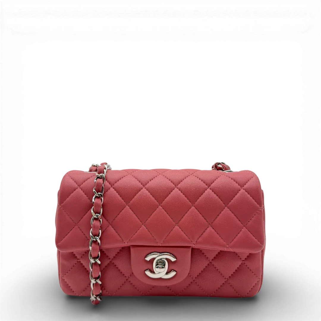 https://cdn.shopify.com/s/files/1/0564/9376/8855/files/Chanel_Umhangetasche_Single_Flap_Mini_aus_Lammleder_rosa_vintage_CC_1871.webp?v=1772705719
