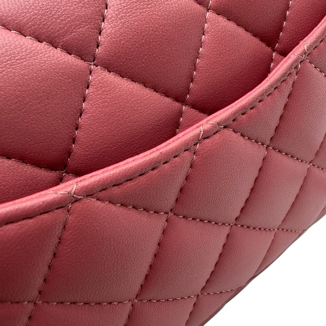 https://cdn.shopify.com/s/files/1/0564/9376/8855/files/Chanel_Umhangetasche_Single_Flap_Mini_aus_Lammleder_rosa_vintage_CC_1888.webp?v=1772705829