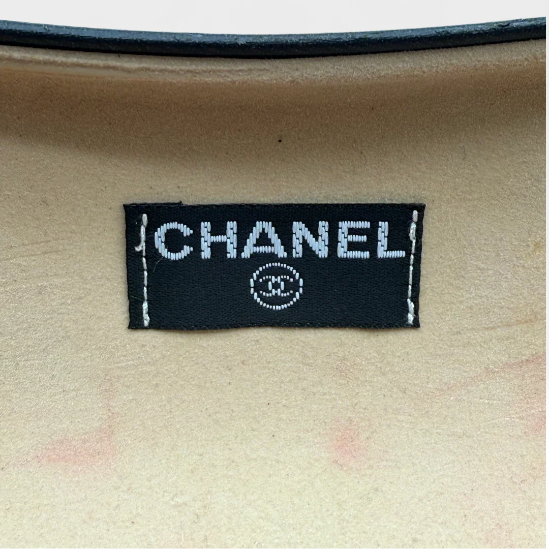 https://cdn.shopify.com/s/files/1/0564/9376/8855/files/Chanel__Sonnenbrille__Rahmenlos__vintage__luxury__CC__sunglasses015.webp?v=1748426602